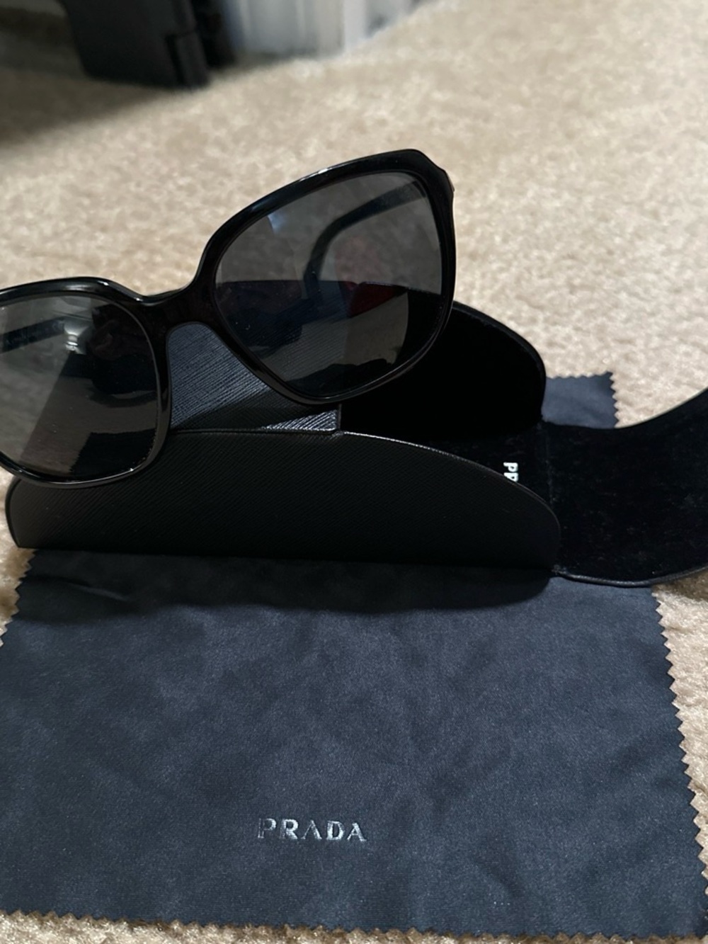 Prada Women’s Black Oversized Square Sunglasses - Polarized